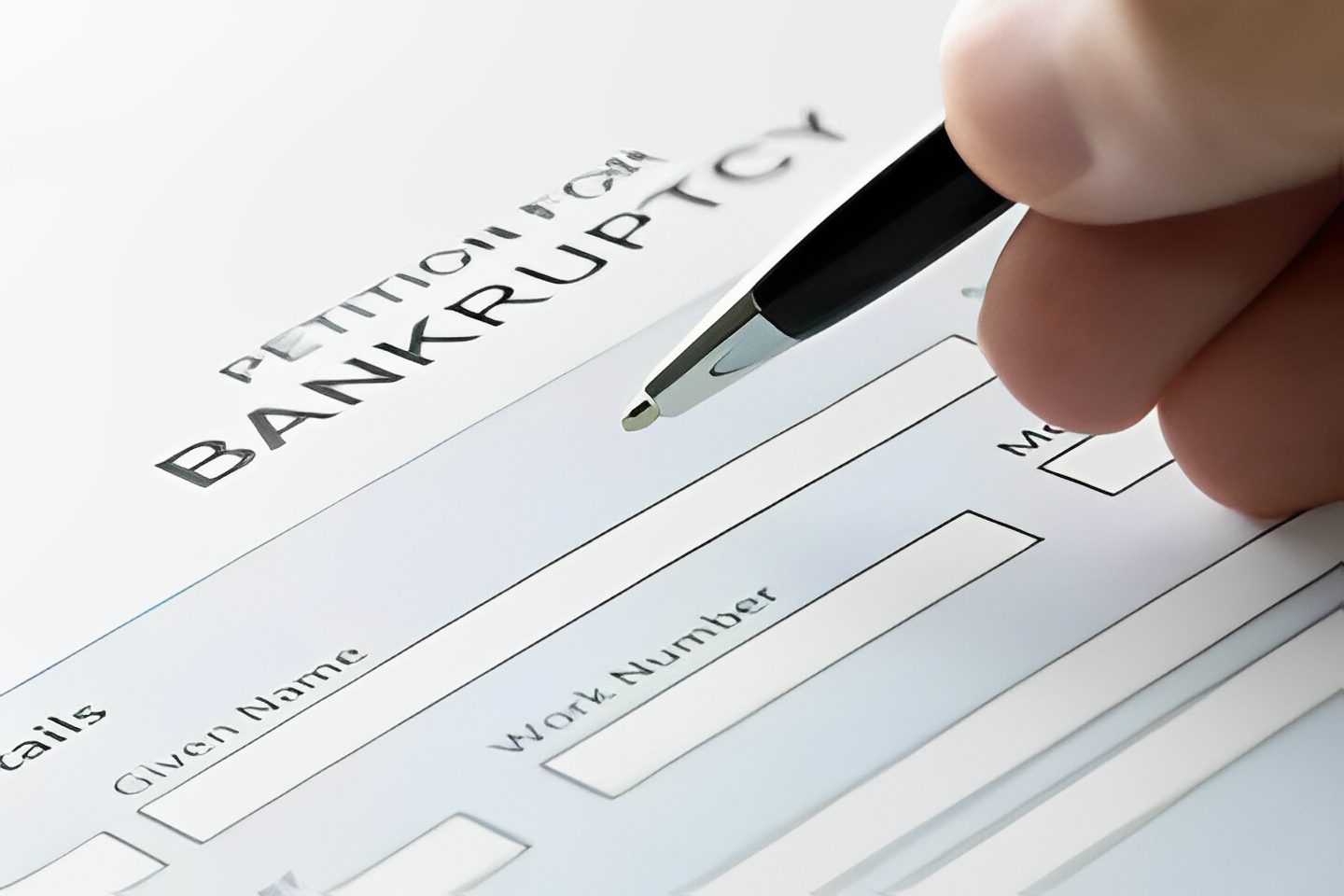 Filling out a bankruptcy petition form.